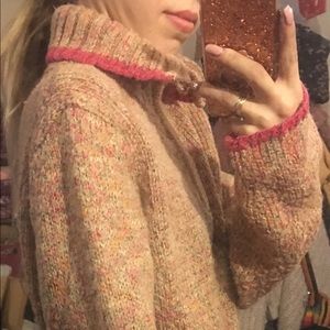 Warm brown turtle neck sweater with pink trim